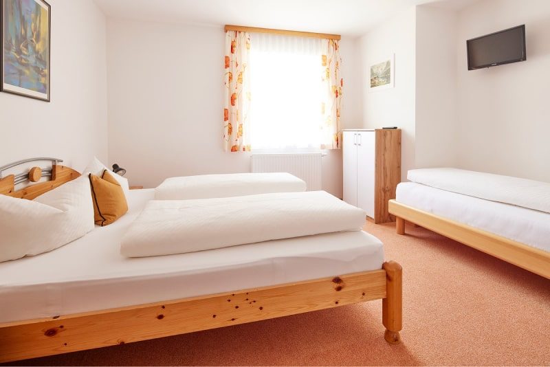 Hohe Salve – Schlafzimmer mit Doppel- und Einzelbett
